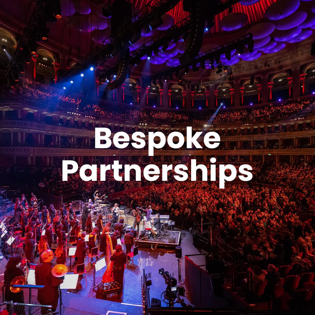a stage at the Royal Albert Hall with the words "bespoke partnerships" overlaid in white text.