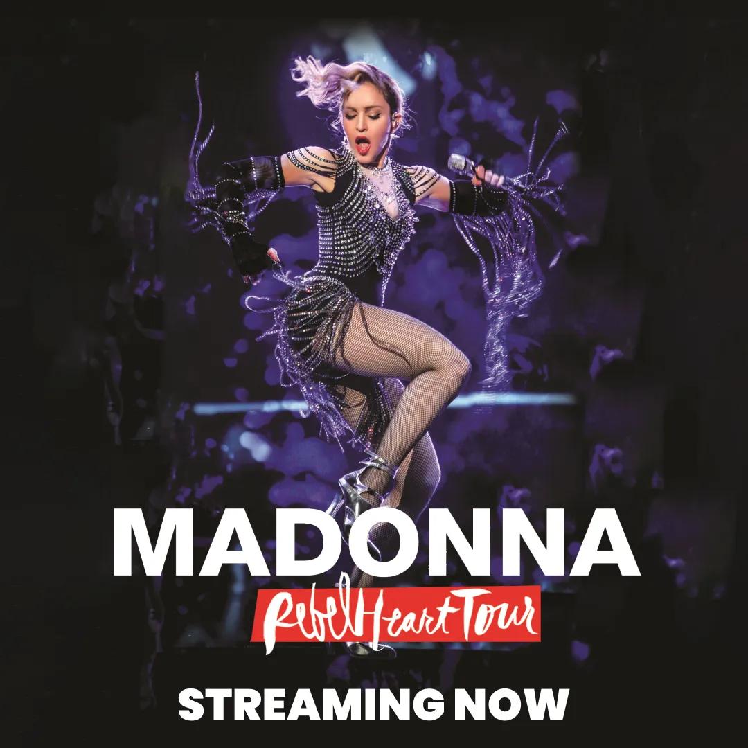 Image of Madonna in an elaborate stage costume, dancing energetically, with text that reads "Madonna Rebel Heart Tour Streaming Now.