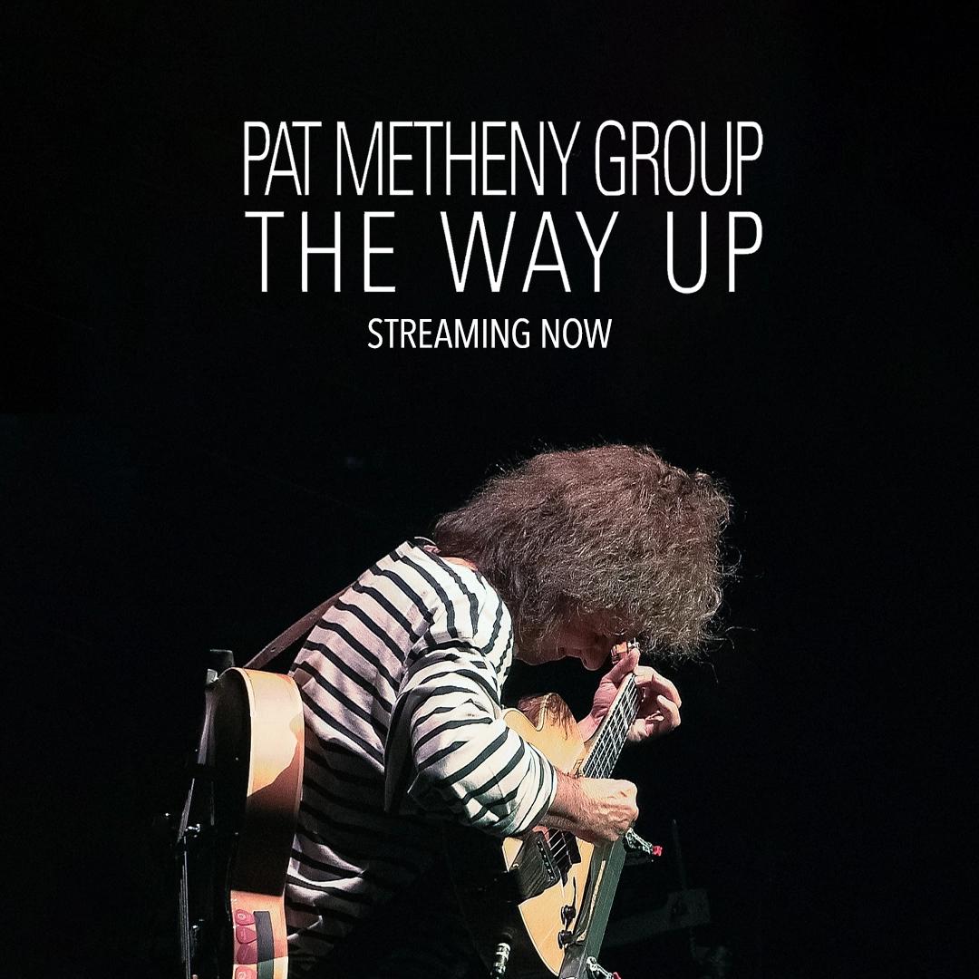 Pat Metheny playing an electric guitar on stage under the text, "Pat Metheny Group The Way Up - Streaming Now.