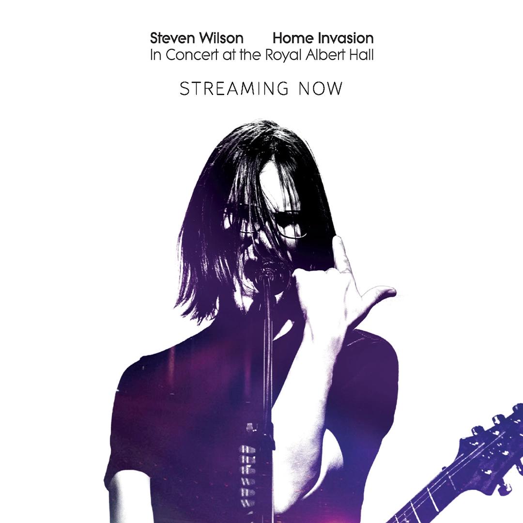 Steven Wilson holding a microphone and guitar is passionately singing. Text above reads: "Steven Wilson Home Invasion In Concert at the Royal Albert Hall STREAMING NOW.