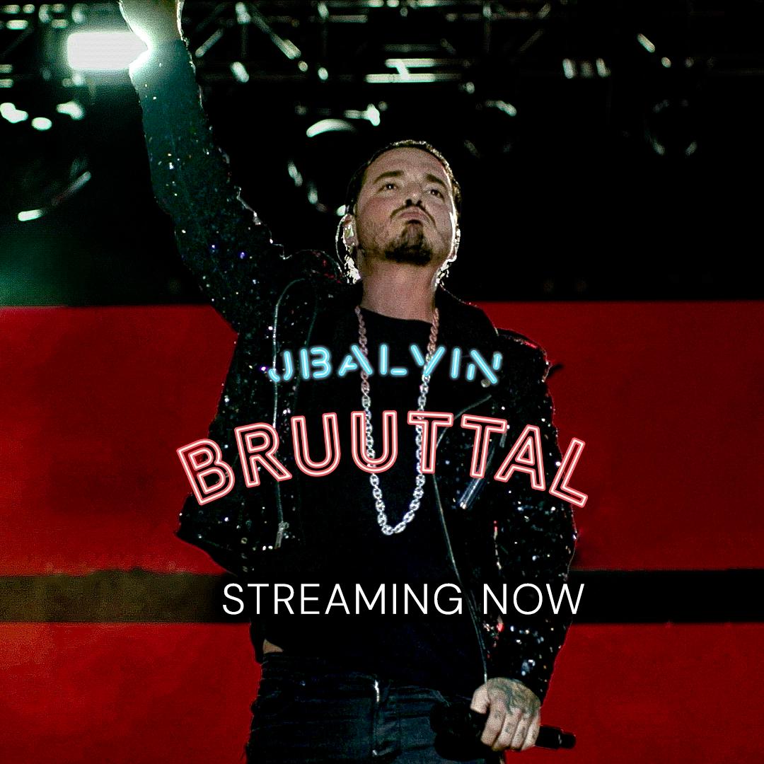 J Balvin in a black outfit with a microphone performs on stage. The text reads, "J Balvin BRUUTTAL Streaming Now.