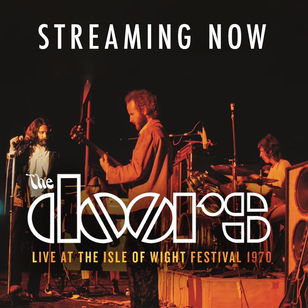 The Doors performing on stage with the text "Streaming Now" at the top and "The Doors Live at the Isle of Wight Festival 1970" at the bottom.