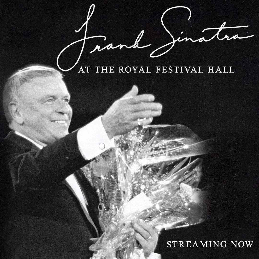 Black and white photo of a Frank Sinatra in a suit, holding a large bouquet of flowers, with the text "Frank Sinatra at the Royal Festival Hall" and "Streaming Now" above him.