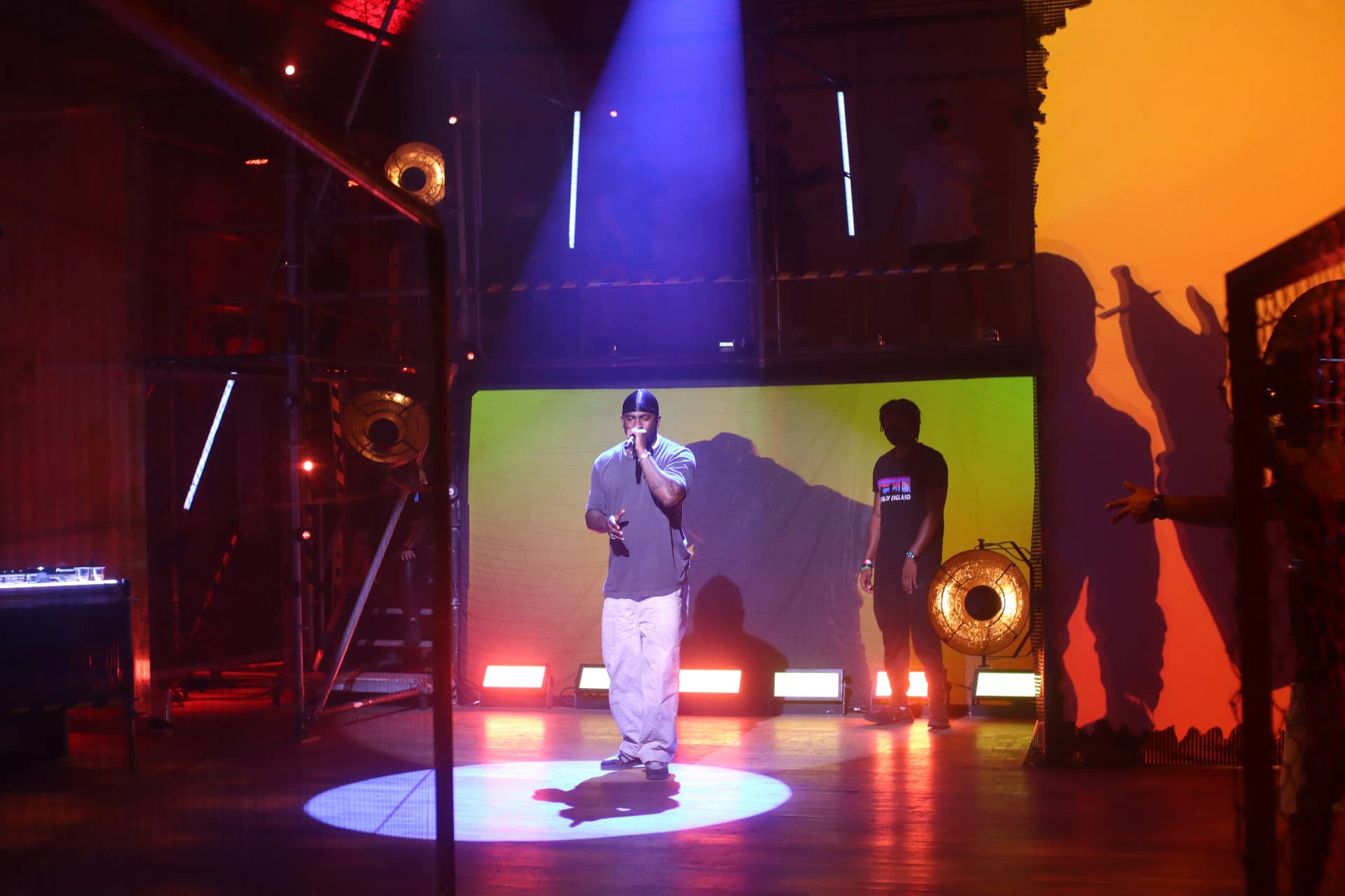 Skepta in front of an LED screen