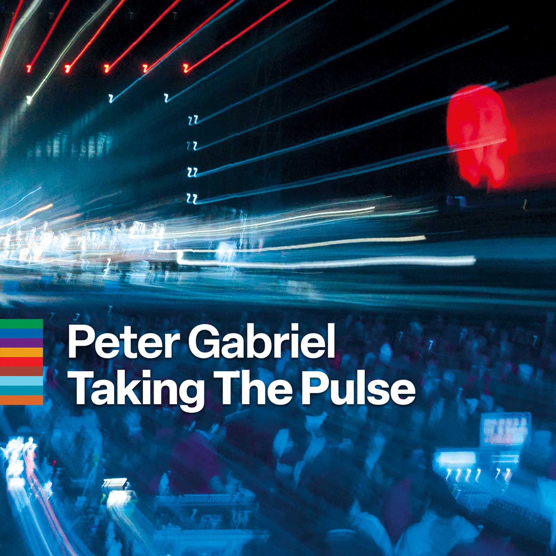 Blurred neon lights streak across a night scene with a crowd below; white text reads "Peter Gabriel Taking The Pulse" over the image.