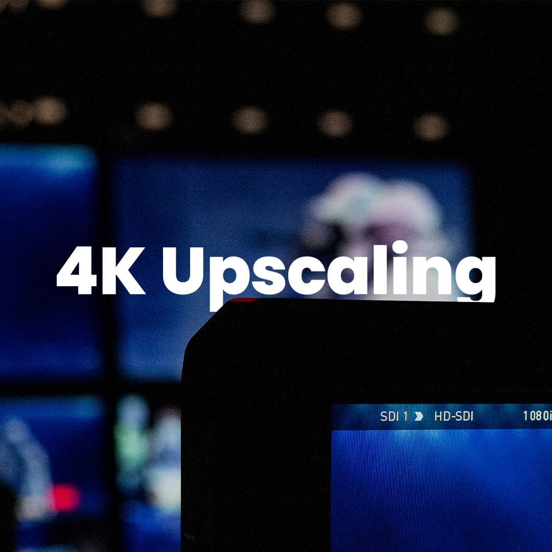 Text "4K Upscaling" appears over a blurred background of video screens, with one screen showing "SDI 1 HD-SDI 1080i.