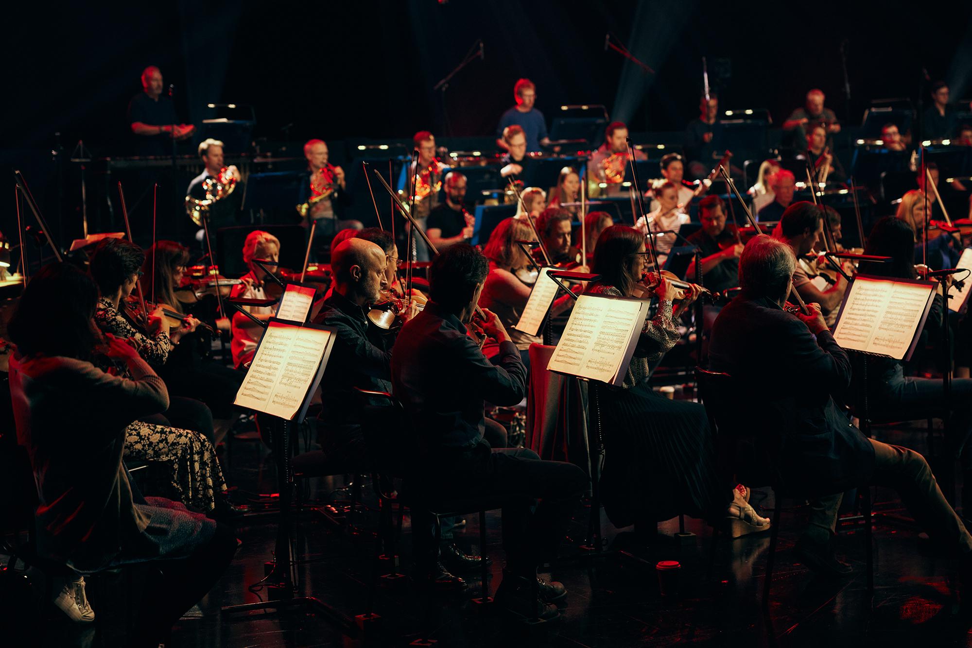 the Royal Philharmonic Orchestra's string section at the recording of global livestream performances of Igor Stravinsky's The Firebird, Petrushka, and The Rite Of Spring