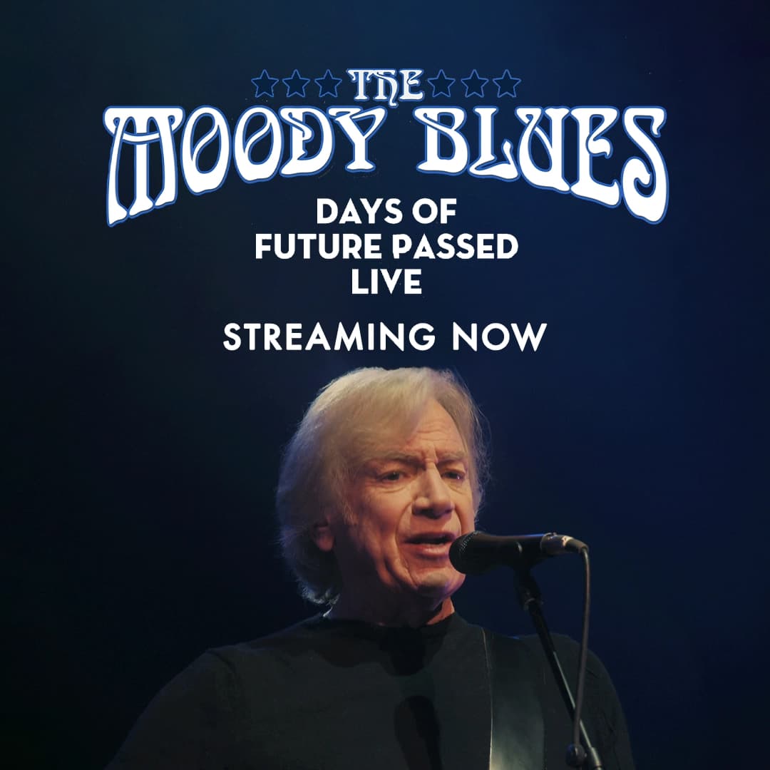 The Moody Blues performs with a guitar on stage. Text above him reads, "The Moody Blues. Days of Future Passed Live. Streaming Now.