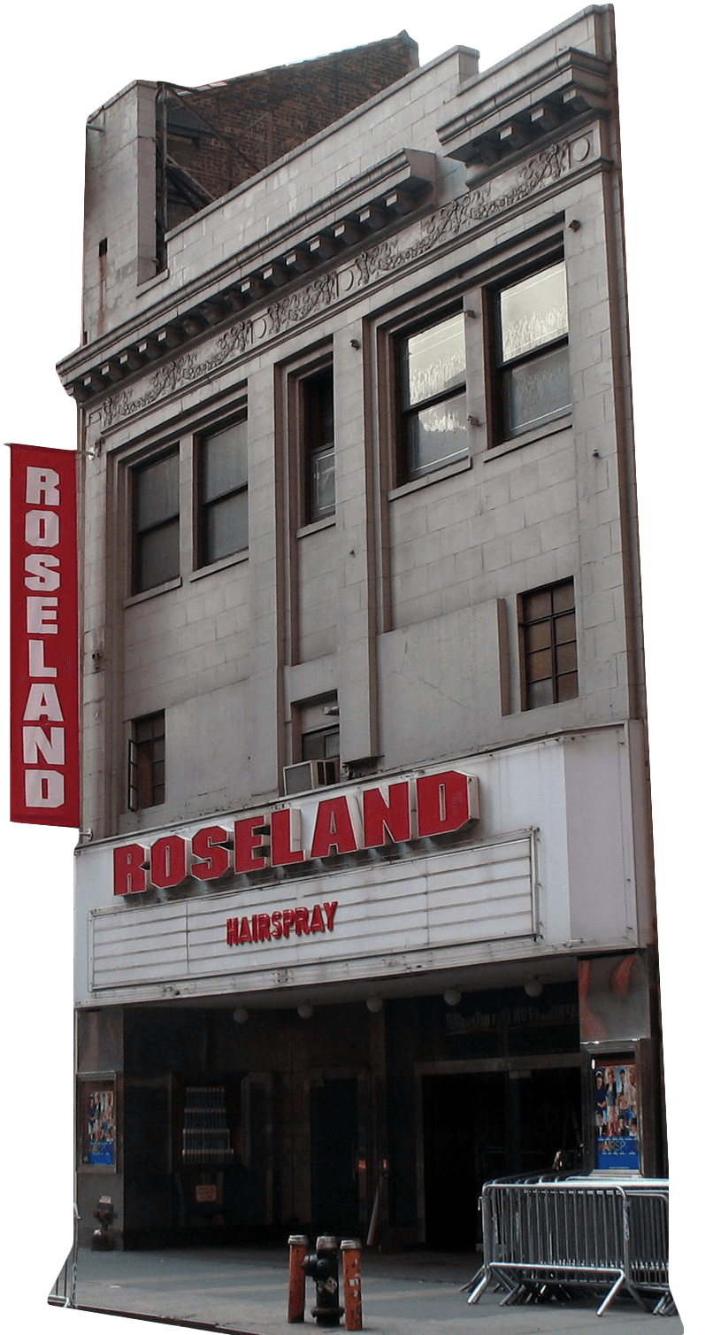 Street view of the Roseland theater building with a marquee sign displaying "HAIRSPRAY" and red "ROSELAND" letters on the facade.
